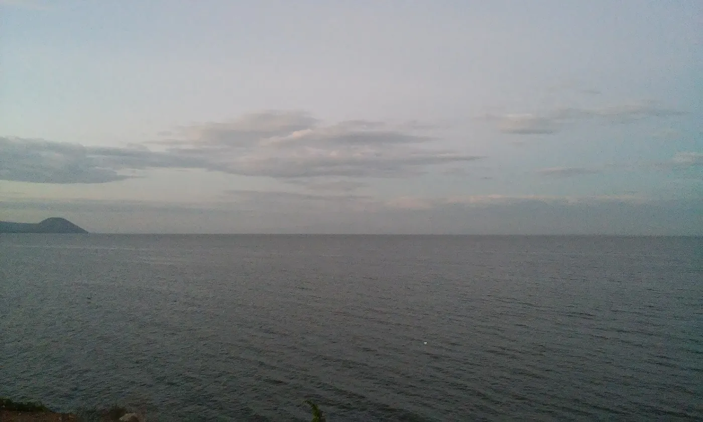 Lake Managua seen from the Malecón promenade under a wide sky