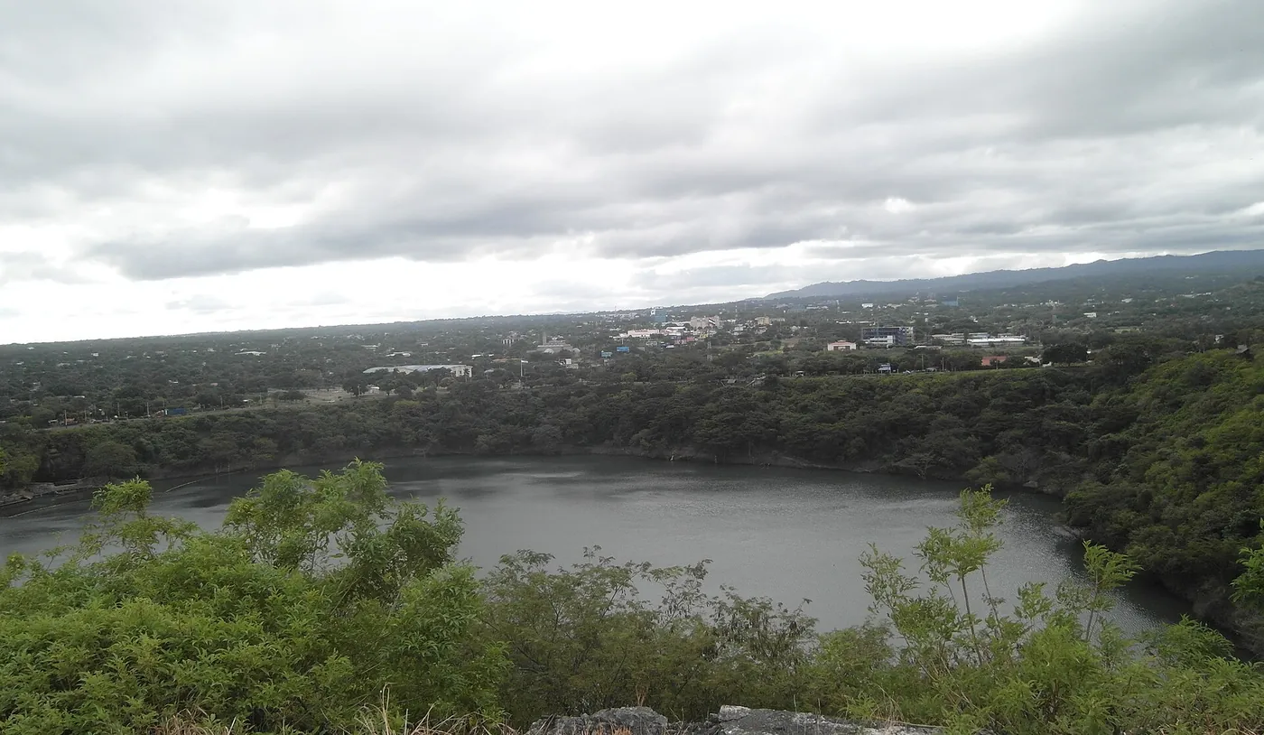 A wide view over Managua's low rooftops toward the lake